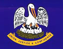 Louisiana flag is blue with white pelican on brown nest with 3 small white pelicans in nest and state motto below reading union, justice and confidence.
